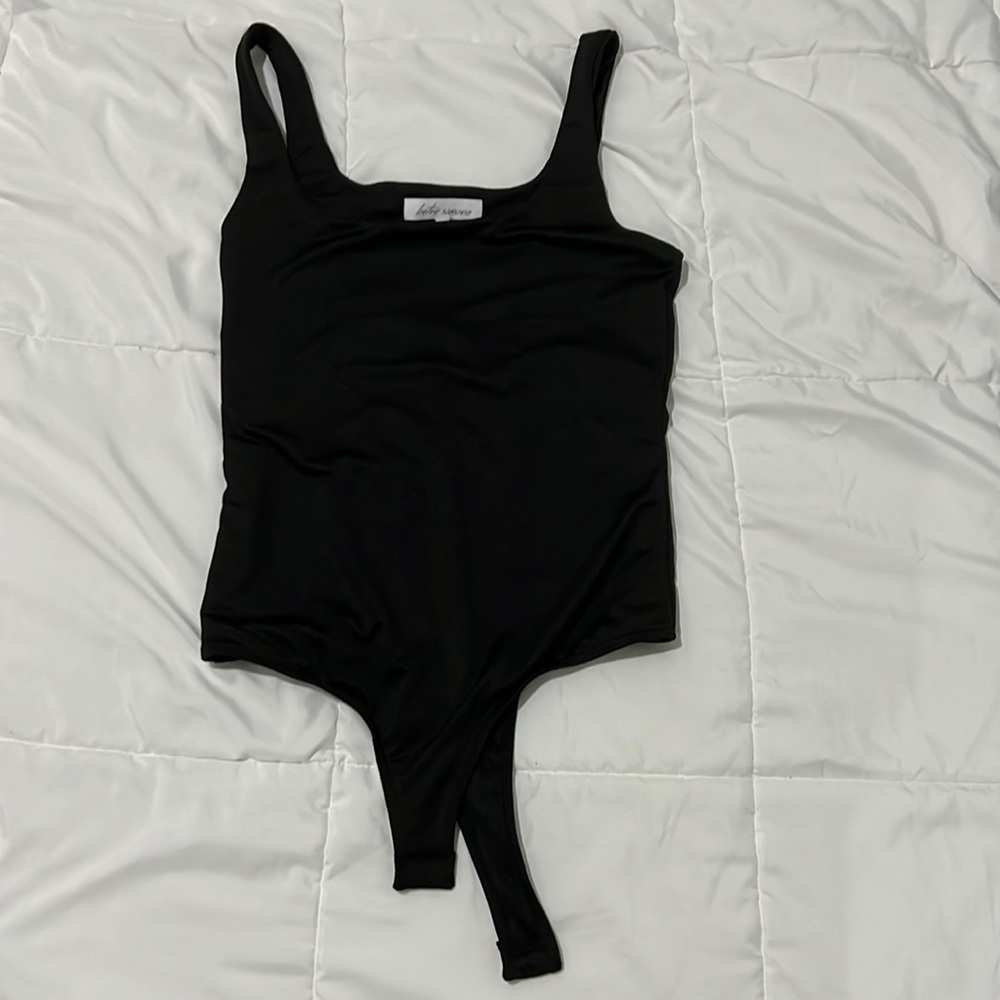 Black stretch sleeveless body suit. Size small.